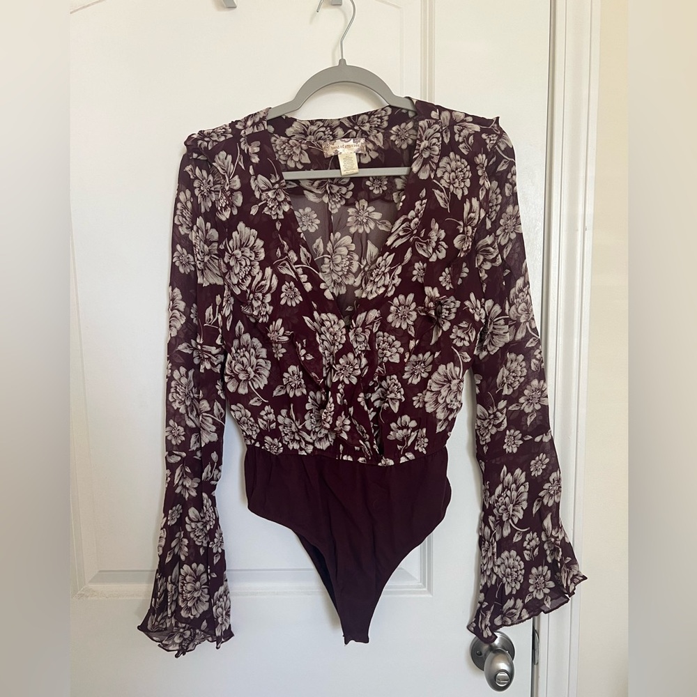 Bell sleeve body suit